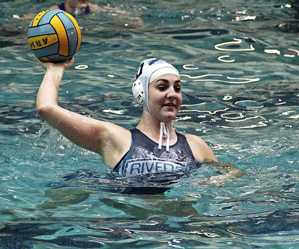 Auburn Riverside senior Charissa Dorn in the water for the Raven girls water polo team.