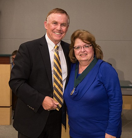 King County Councilmember Pete von Reichbauer presents Debbie Christian of Auburn with the first annual MLK Medal of Distinguished Service Award recognizing her positive impact on the community through service.