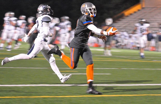 Auburn Mountainview's Gavin Robertson scores one of his two touchdowns on a pass from Gresch Jensen. Robertson finished the game with nine catches for 138 yards and two TDs.