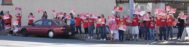 Teachers rallied for their schools in downtown Auburn on Thursday.