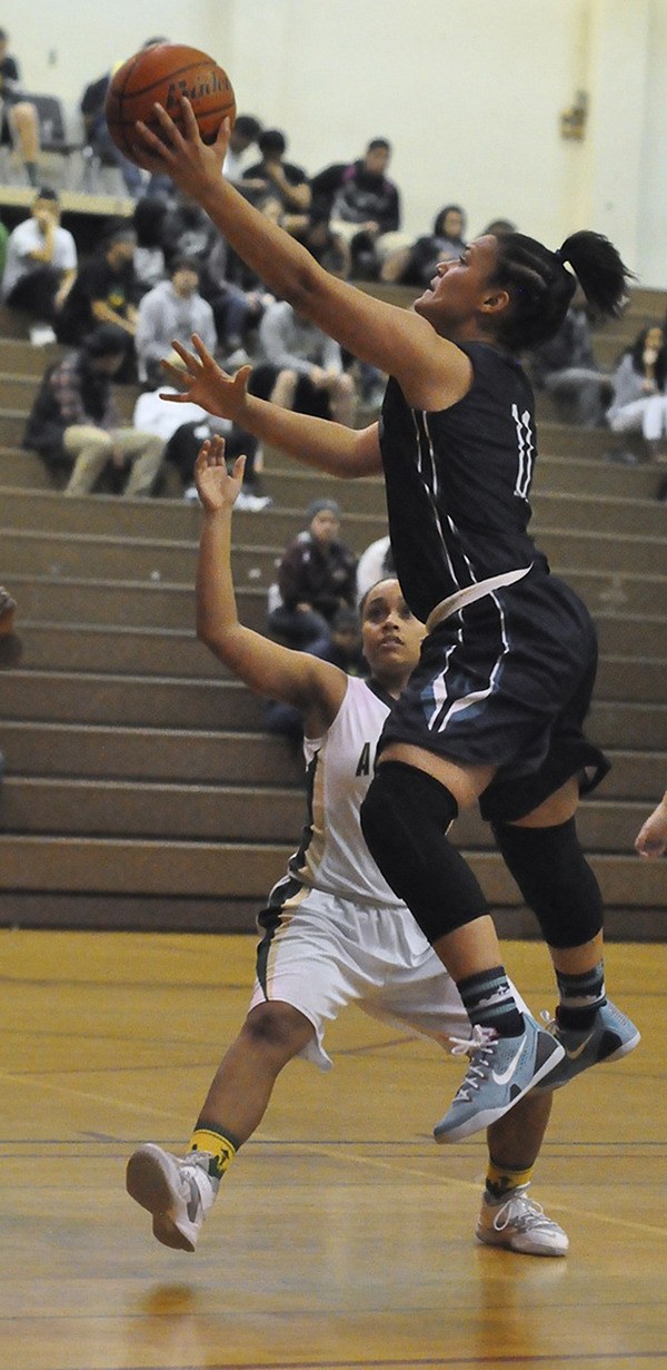 Auburn Riverside's Olivia Denton elevates for a bucket.