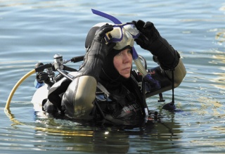 Diving instructor Cindy Ross prepares to lead her students in the Puget Sound waters off the shores of Redondo Beach. Ross