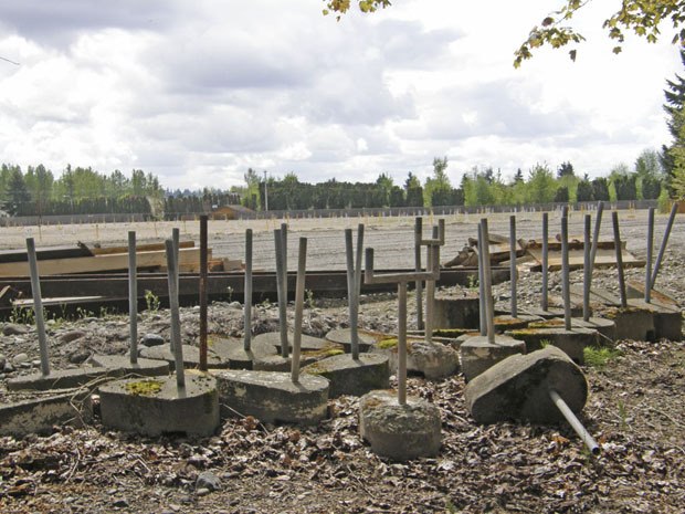 Last picture show: Contractors working for the Robertson Property Group removed poles that once supported speakers at the Valley 6 Drive-In Theaters. Crews were busy clearing the north Auburn site for a multi-phased development.