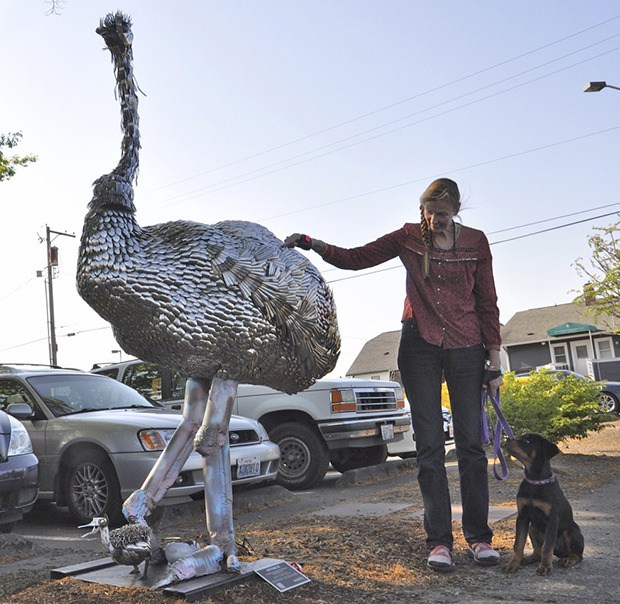 Kathy Northcutt ganders at the 8½ -foot high sculpture