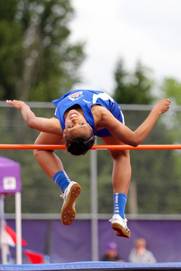 Auburn Mountainview senior Maddie Taylor clears the bar during the district high jump competition.