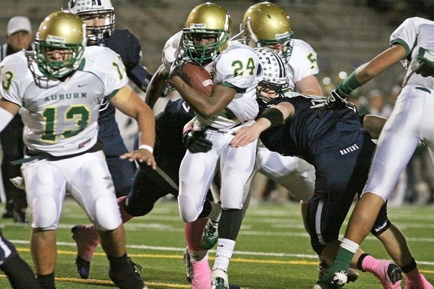 Auburn's Darnell Hagans scrambles for yardage against Auburn Riverside.