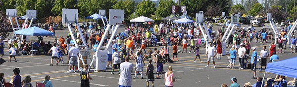 Spectators cheer on competitors at the Emerald Downs EMD3on3 hoops tourney this past weekend.