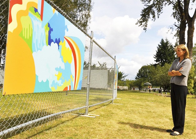 Kristin Duff observes one of the mural paintings