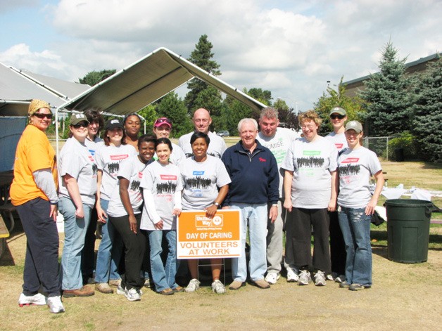 Federal employees who work in King County recently spent a day sprucing up the area around the Auburn Valley Y.