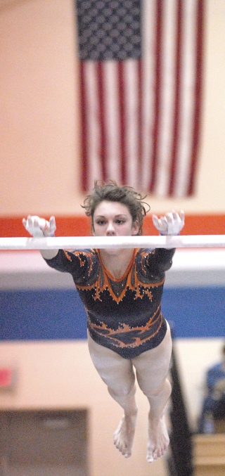 Auburn Mountainview's Kendra Alexson works the uneven bars. The Lions are primed for a shot at state glory this season.