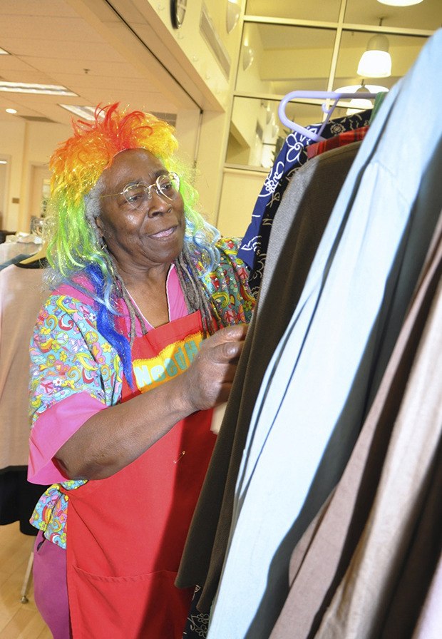 Ethel Cravensweet sifts through the inventory at the Auburn Senior Activity Center’s recent rummage sale. For program information and other upcoming events at the center