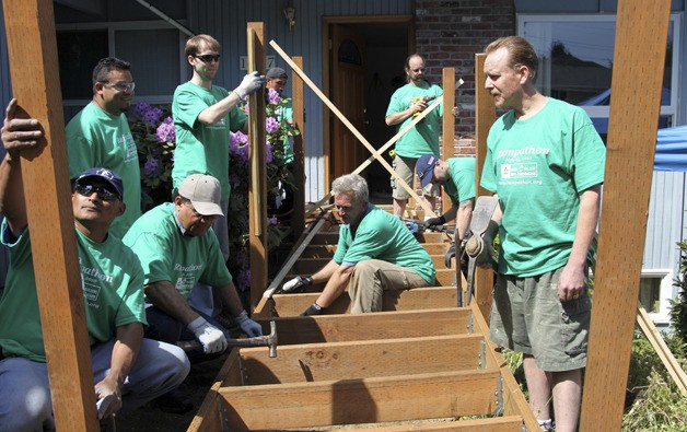 Master Builders Association volunteers work as a ‘Rampathon’ team to build free wheel chair ramps for disabled homeowners. Since 1993