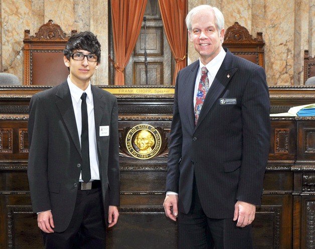 Rep. Mark Hargrove with student page Alex Krause on the House floor in Olympia.