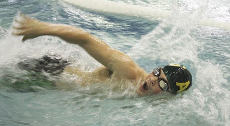 Auburn’s Matt Nordlie competes at the regional swimming meet at Rogers High School. Nordlie qualified for state in the 50 free with a 22.73 time.