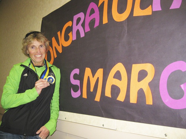 Kevette Smargiassi returned to work at Rainier Middle School where students and staff celebrated her solid effort at the Boston Marathon.