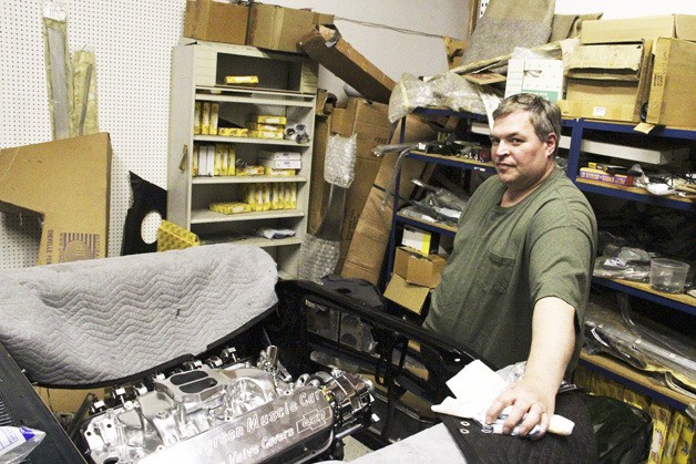 Bob Everett stays busy working on customers’  GM muscle cars at his Auburn shop.