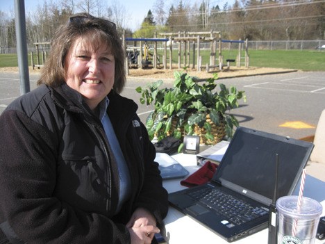 Principal Sally Colburn moved her desk to the outdoor playground