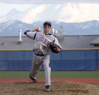 Cody Hebner delivers a pitch against Enumclaw this past Friday. Hebner earned the win on the mound for the Lions