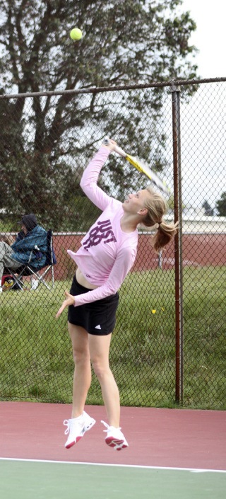 Sandy Dennett and the Auburn tennis squad are looking to finish up the season with a first-place finish in the South Puget Sound League North 4A.