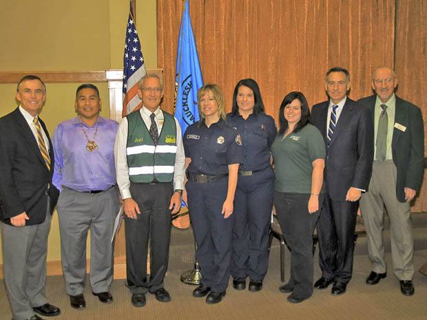 King County Executive Dow Constantine honored the Muckleshoot Indian Tribe and Wesley Homes Lea Hill of Auburn with the 2012 Executive's Awards for Community Preparedness on Wednesday. From left: King County Councilmember Pete von Reichbauer; Muckleshoot Indian Tribal Council Vice Chair Mike Jerry Sr.; Wesley Homes Campus Administrator Scott Hulet; Valley Regional Fire Authority's Kelly McDonald; VRFA's Kelly Williams; Heather Kitchen with Auburn Emergency Management; Constantine; and Auburn City Council member Rich Wagner.
