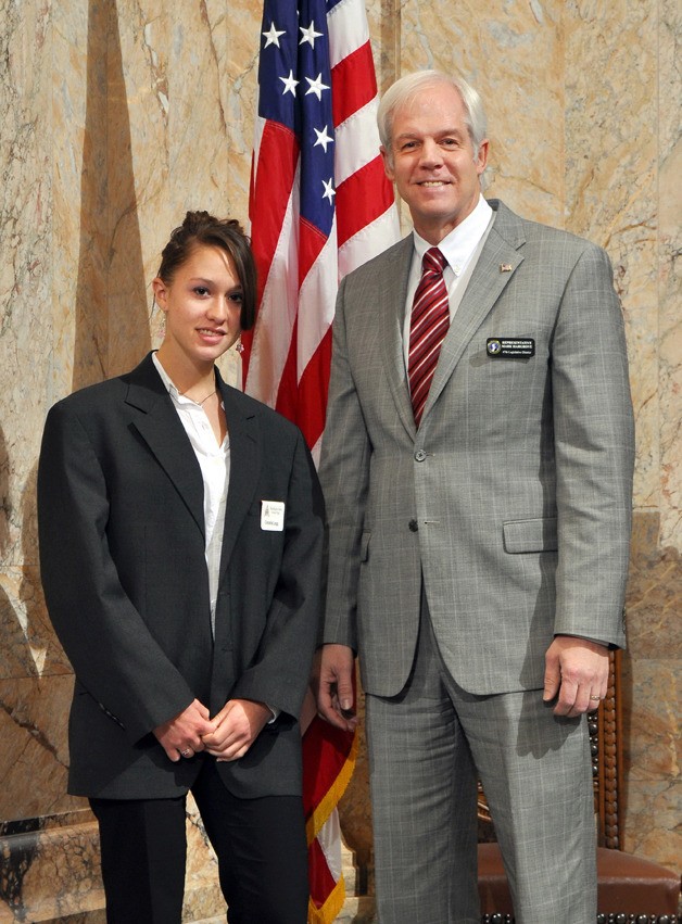 Rep. Mark Hargrove with student page Cecelia Legg on the House floor in Olympia.