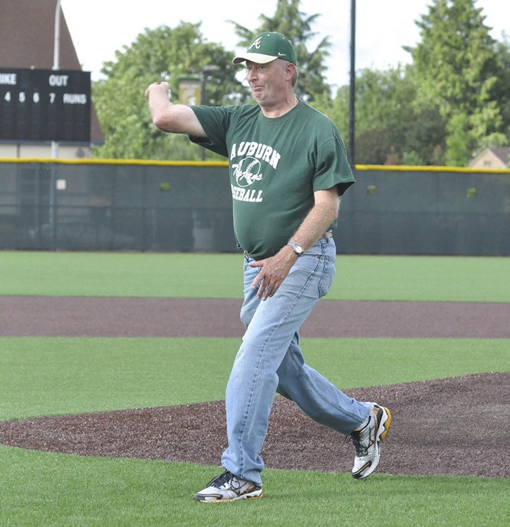 Lynn Christian throws out the first pitch June 2 at Auburn High School to commemorate the start of the Cam Christian Memorial Tournament. Proceeds will be donated to establish a scholarship fund for baseball players at Auburn’s three public high schools.
