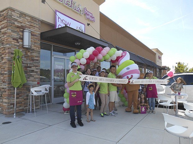 Representatives from the Auburn Area Chamber of Commerce and community leaders joined the staff from Menchie's for an Aug. 9 ribbon-cutting ceremony.