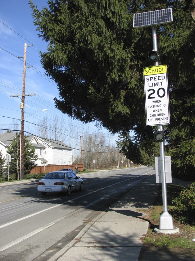 City officials are considering a couple of potential changes to the City code that would allow a reprogramming of the signs to flash at times better suited for the school zones that have them.