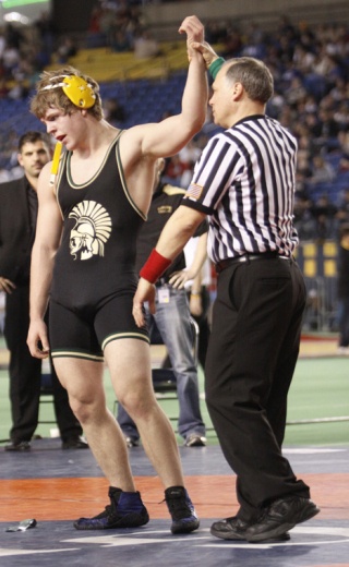 Auburn's Jake Swartz captures his third Washington State wrestling title. Schwartz defeated Decatur's Darren Faber 7-0 for the 189-pound crown.