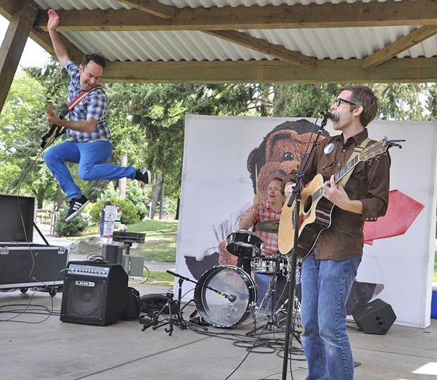 Jack Forman leaps as Korum Bischoff (on drums) and Drew Holloway jam during the Recess Monkey’s Kids Summerstage visit last year. The trio