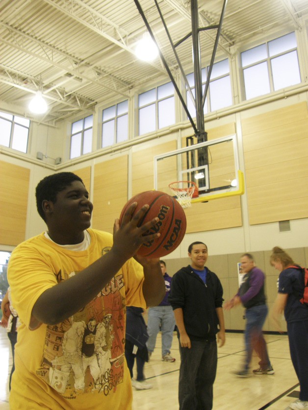 Kasa Brown targets the hoop during the official unveiling of Auburn’s new gymnasium and activity center Tuesday.