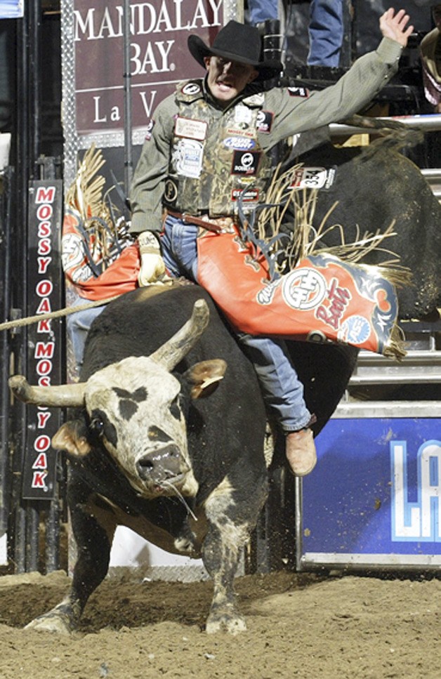 J.W. Hart rides the bull