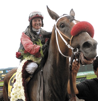 Jennifer Whitaker guided Wasserman to a historic victory in the Longacres Mile in August. Wasserman was voted Horse of the Meeting. Whitaker took Top Riding Achievement honors for becoming the first woman to capture the Northwest jewel.