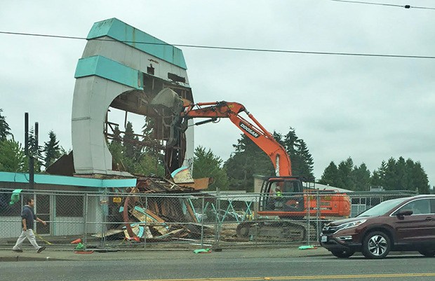 Connie LaFave captured the demolition of the iconic Big Daddy's Drive In sign on Tuesday.
