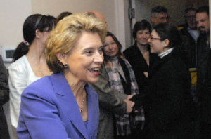 Gov. Christine Gregoire greets people upon her arrival at the Rainbow Café in Auburn on Monday.