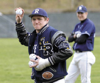 Auburn Riverside’s Zack Gagnon pitches some Wiffle Balls to teammates before their SPSL 3A game on April 9 against Franklin Pierce. Gagnon is determined to return to action if the Ravens can stay in the hunt for a playoff spot.
