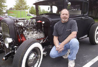 Covington’s Phil Hunter sometimes drives his 1930 Ford Model A to work.  Hunter