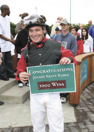 Kevin Radke celebrates in the winner’s circle  at Emerald Downs on June 7 after riding to the 1