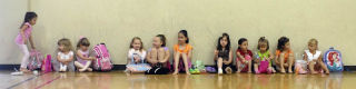 Students in Stephanie Cox’s ballet class wait for the morning lessons to begin.