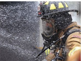 Valley Regional Fire Authority firefighter Kevin Nold has contaminants he was exposed to washed off after a training burn this week. One of the main reasons for the decontamination is to prevent cancer. This was all part of a VRFA training burn in Pacific.