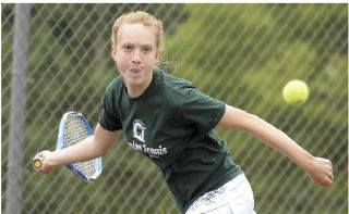 Peyton Prothero of Auburn keeps her eye on the ball and takes aim at a forehand shot on Tuesday during the Auburn Valley Junior Tennis tournament girls singles competition. Prothero