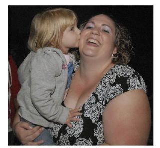 Auburn native Dayla Walker gets a victory kiss from her daughter Haley