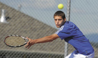 Nick Allen keeps his eye on the ball during practice at Auburn Mountainview last week. The Lions senior played in the SPSL 3A final last year and went to district. This spring