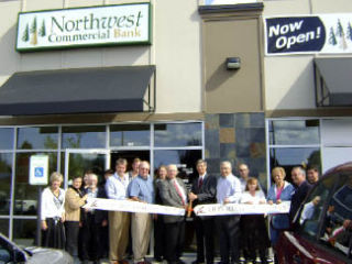 Northwest Commercial Bank staff joined members from the Auburn Area Chamber of Commerce in a ribbon cutting ceremony