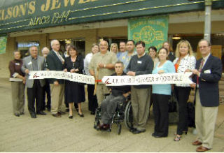 Nelson’s Jewelers recently celebrated its 64th anniversary and its return as a member of the Auburn Area Chamber of Commerce with a ribbon cutting ceremony at its location