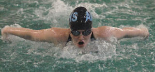 Hailey Reichert competes in the 100 butterfly during the Auburn Riverside versus Kentwood dual meet this past week. Reichert finished first in the event and also won the 200 free.