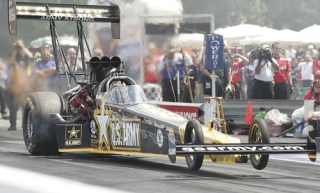 Tony Schumacher powered his U.S. Army Top Fuel dragster to a three-peat at Pacific Raceways last Sunday.