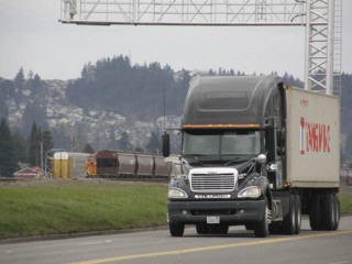 A truck travels along C Street in Auburn