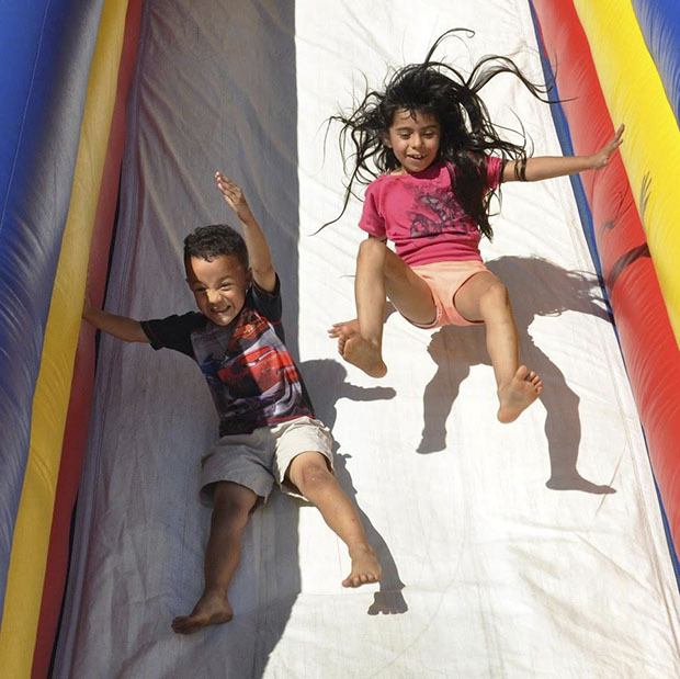 Inflatable rides are part of the fun at the Algona Days Festival.