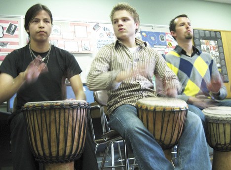 West Auburn High social studies teacher Tom Parsons joins his students